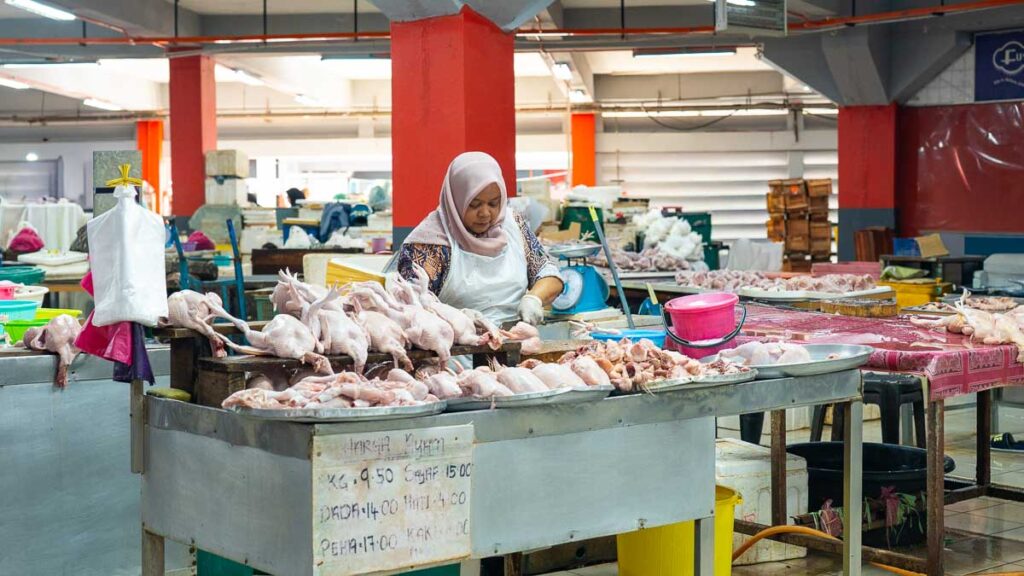 Woman selling chicken at Khadijah Market