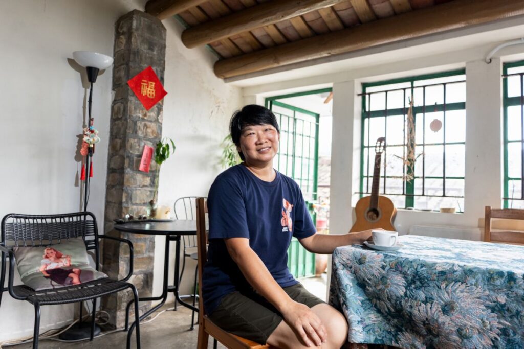 Angela So sits in her cafe Coffee Terrace Lai Chi Wo Hong Kong - RURAL ROOTS (NTU GO-FAR 2026)-17