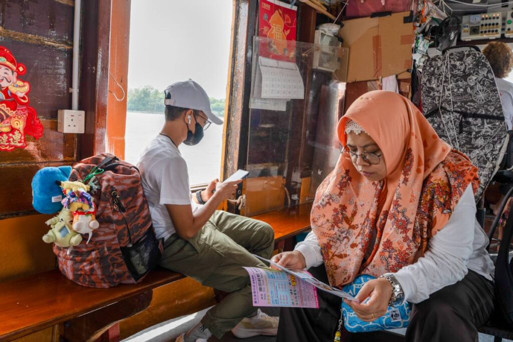Indonesian domestic helpers taking ferry to Yim Tin Tsai Village Hong Kong - RURAL ROOTS (NTU GO-FAR 2026)