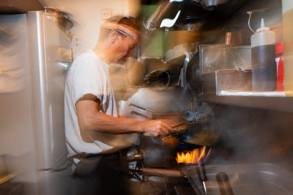 Liu Wai Fung cooks fried rice at Chef de Yim Tin on Yim Tin Tsai - RURAL ROOTS (NTU GO-FAR 2026)